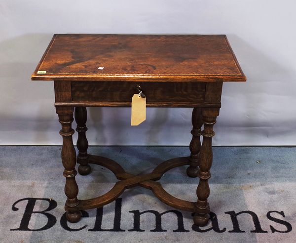 An 18th century and later oak single drawer side table on 'X' frame base, 80cm wide x 71cm high.