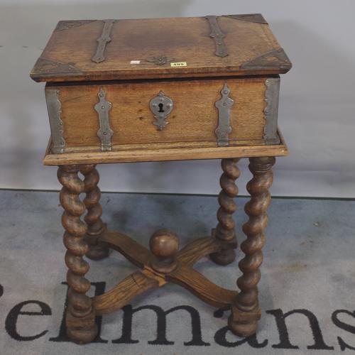 An 18th century oak bible box on later added 'X' frame stand, 52cm wide x 77cm high.