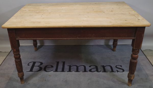 A late Victorian rectangular pine kitchen table on tapering supports, 135cm wide x 75cm high.