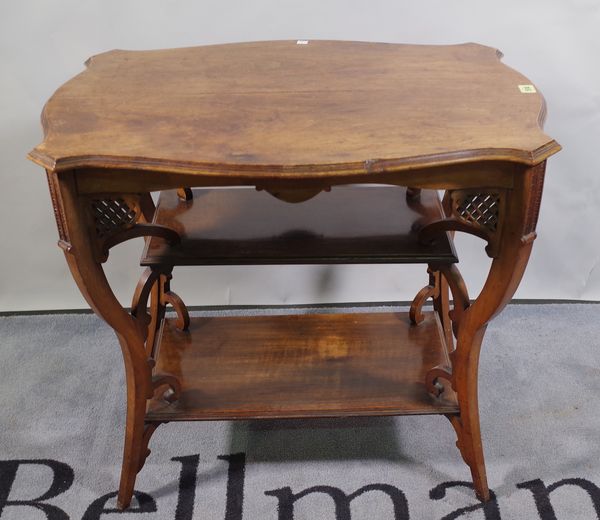 An Edwardian walnut three tier shaped side table, 77cm wide x 67cm high, and a 19th century mahogany toilet mirror with three drawer base, 57cm wide x