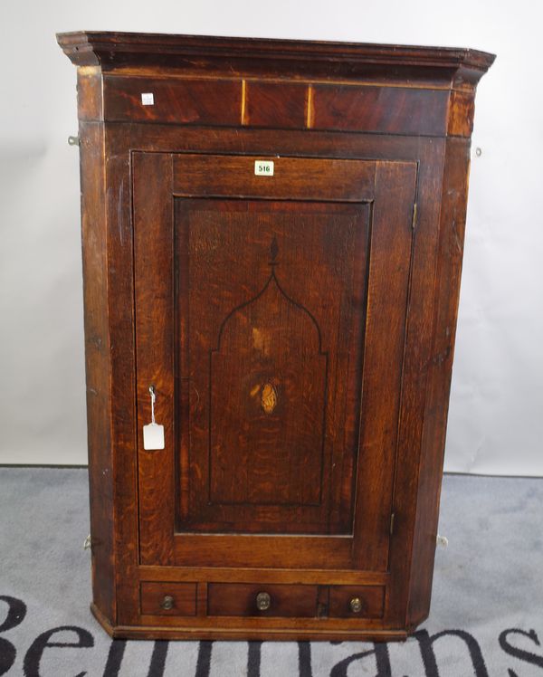 A 19th century oak corner cabinet, 79cm wide x 114cm high.