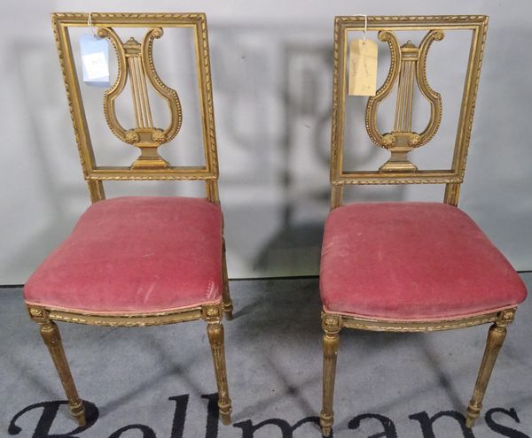 A pair of 19th century gilt bedroom chairs, 32cm wide x 89cm high.