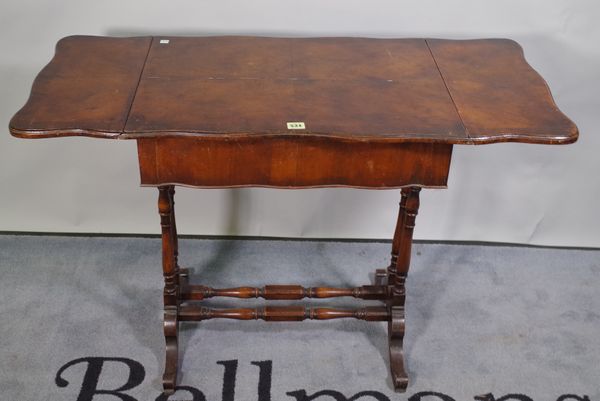 An early 20th century Gothic Revival oak piano stool, 60cm wide x 54cm high, a small walnut drop flap side table, 64cm wide, and an Edwardian mahogany