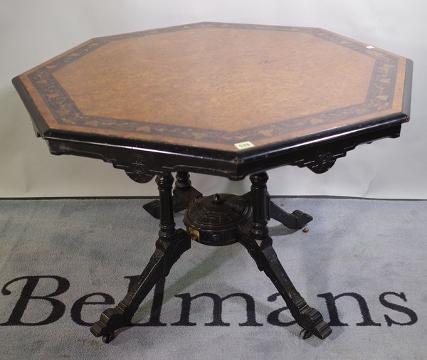 A 19th century Aesthetic type octagonal occasional table with ebonised base and burr walnut top, 97cm wide x 76cm high.