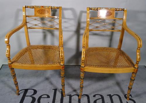 A pair of Regency style cane seated open armchairs, 49cm wide x 89cm high, (2).