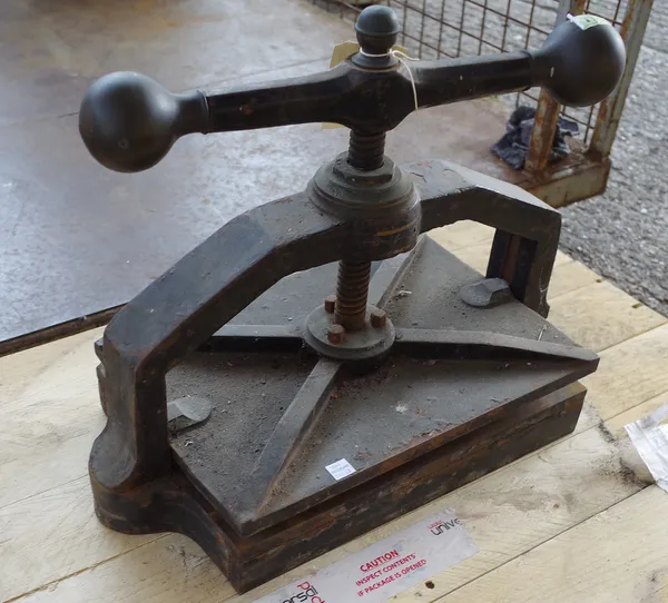 An early 20th century book press, 49cm wide, and a modern fire grate, (2).