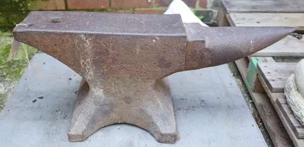 An early 20th century cast iron blacksmith's anvil, 70cm x 30cm high.