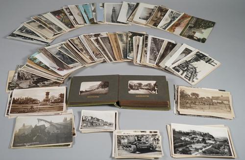 POSTCARDS / PHOTOGRAPHS:  a collection of approx. 190 postcards, Great Britain and a few military, together with a cloth bound photo. album, 24pp, Isl