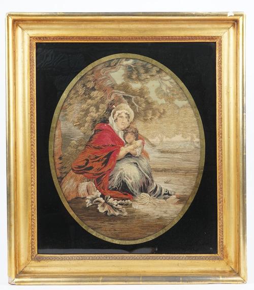 A Regency woodwork picture on silk, depicting mother and child against a landscape, in a rectangular giltwood frame, 55cm x 48cm.