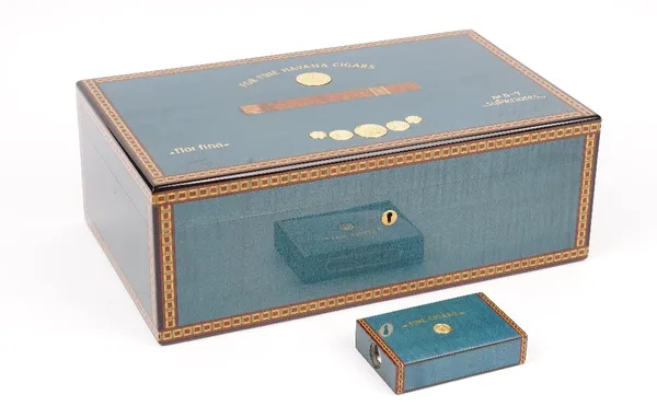 Elie Bleu Medal collection cigar humidor, with Spanish cedar interior and marquetry inlay to the hinged lid, 40cm x 24cm x 14.5cm, and a matching matc