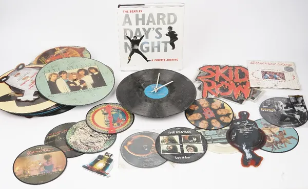 A collection of picture disc vinyl records, 33rpm and 45rpm, various artists, including David Bowie, The Jean Genie, 40th Anniversary, 45rpm, given to