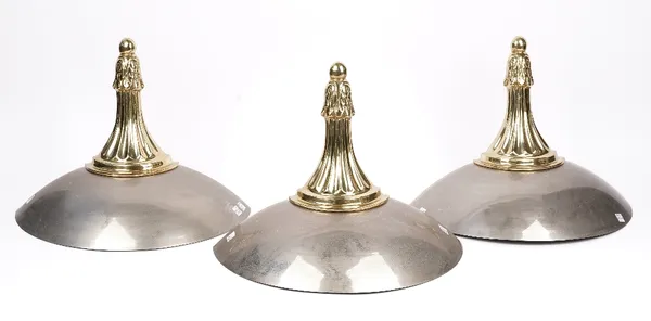 A set of three gilt metal and chrome wall mounted up-lighters of dished demi-lune form with fluted supports, 40cm wide. (3)