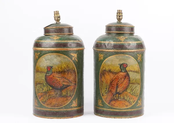 A pair of tole peinte lamps, early 20th century, detailed with pheasants against a green ground, 45cm high.