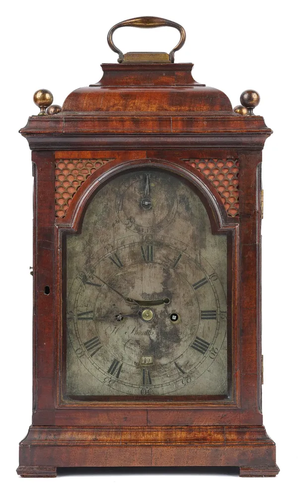 A George III mahogany bracket clock by H. Thomas, London, in a domed case with silvered dial, the fusee movement with verge escapement and floral engr