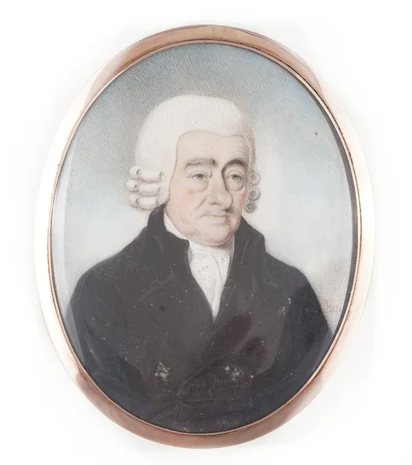 Gold framed Georgian miniature of a man in a wig, signed with initials, reverse engraving and woven two colour hair, 7.1cm.