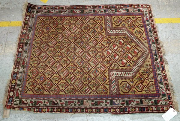 A Marasali prayer rug, Caucasian, the saffron mehrab with a trellis of flowers, rising to an arch of similar design, an ivory bird border, 140cm x 115