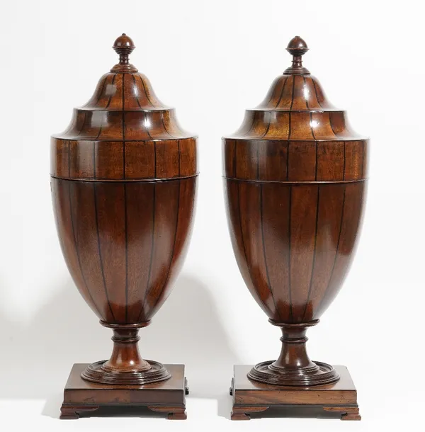 A pair of 19th century inlaid mahogany urn shaped pop-up knife boxes, on square bases, 64cm high x 25cm diameter.