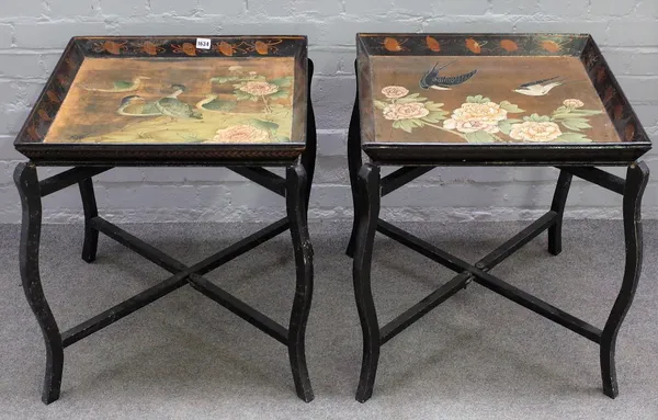 A pair of Eastern bird decorated lacquer square tray top occasional tables on folding stands, 58cm wide x 61cm high.