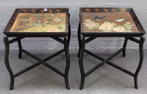 A pair of Eastern bird decorated lacquer square tray top occasional tables on folding stands, 58cm wide x 61cm high.