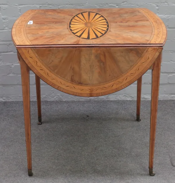 A George III marquetry inlaid mahogany oval Pembroke table, with end frieze drawer on tapering square supports, 73cm wide x 72cm high.