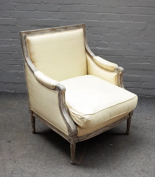 A Louis XVI style distressed grey painted square back armchair, on fluted supports, 70cm wide x 92cm high.