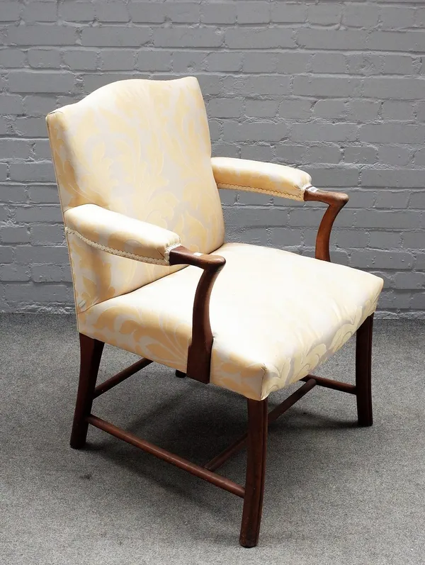 A 19th century Continental mahogany open armchair, on splayed supports, 71cm wide x 99cm high.