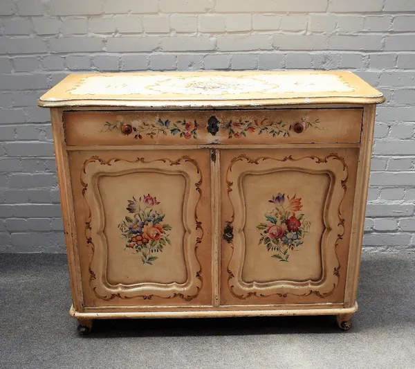 A 19th century and later floral polychrome painted Continental serpentine side cabinet, with single drawer over shaped panel cupboards, 115cm wide x 9