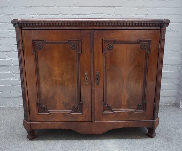 An 18th century Dutch mahogany buffet, the foldout shelf back over a pair of panelled doors, 118cm wide x 100cm high.