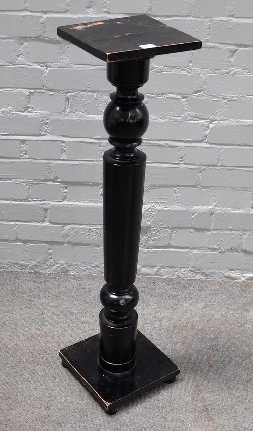 An ebonised jardiniere stand, with square top and turned column, 98cm high.