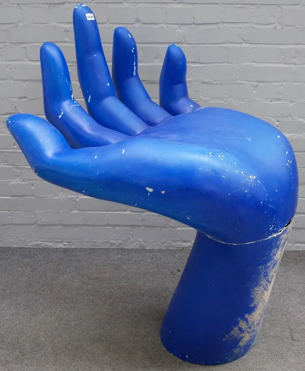 After PEDRO FRIEDEBERG, a blue painted fibreglass seat in the form of an open hand, 65cm wide x 140cm high.