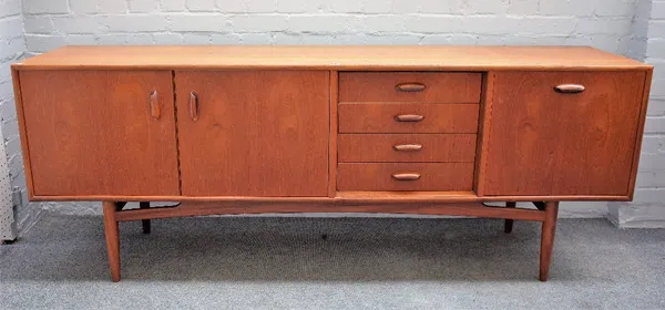 G PLAN,  a mid-20th century teak sideboard on turned supports, 206cm wide x 79cm high x 45.5cm deep.