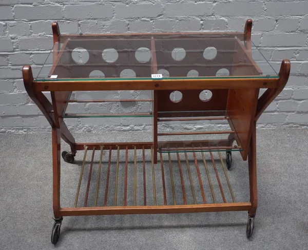 A mid-20th century teak and glass serving trolley, with split levels and slatted undertier, 80cm wide x 74cm high.