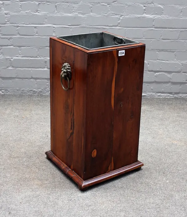 A 19th century yew square stick stand, on bun feet, 35cm wide x 62cm high.