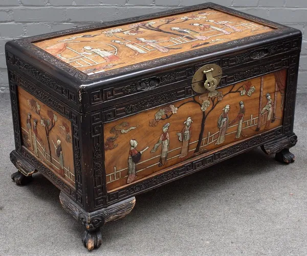 A 20th century Chinese ebonised hardwood and stone inlaid rectangular trunk, on paw feet, 91cm wide x 53cm high.