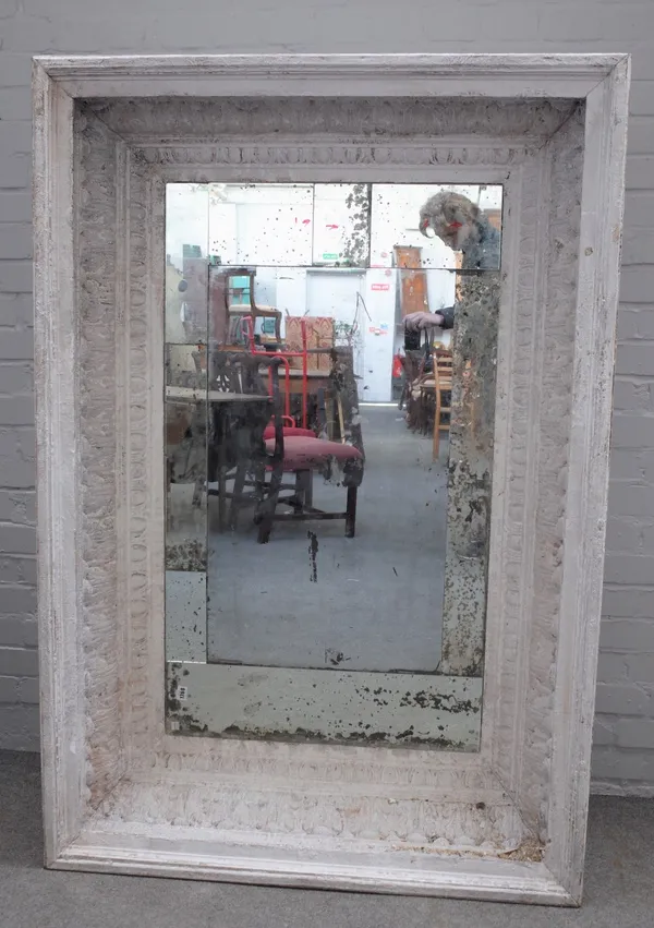 A modern distressed white painted rectangular wall mirror, with deep acanthus and egg and dart moulded frame, 153cm long x 104cm high.