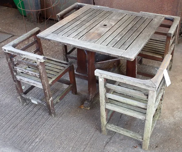 R A LISTER, in the manner of HEALS, a teak square garden table, 91cm wide x 71cm high, together with four interlocking corner chairs.