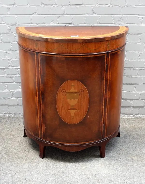 A George III style marquetry inlaid satinwood banded mahogany bowfront single door side cabinet, on splayed feet, 84cm wide x 94cm high.