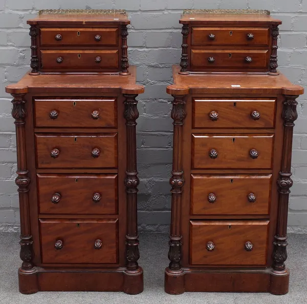 A pair of Victorian mahogany pedestals, each with two drawer upper super structure over four drawers flanked by fluted columns, 51cm wide x 108cm high