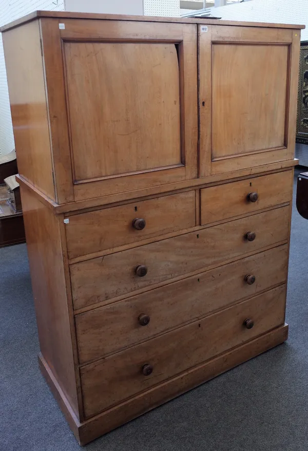 A Victorian mahogany linen press, the pair of doors over two short and three long graduated drawers, on plinth base, 124cm wide x 169cm high.