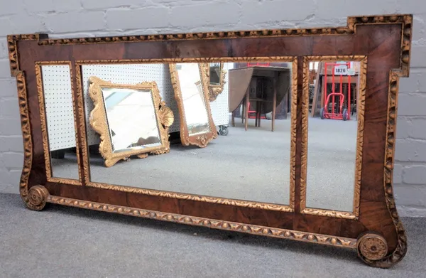 A George II style parcel gilt figured walnut triple plate mirror, 138cm wide x 69cm high.