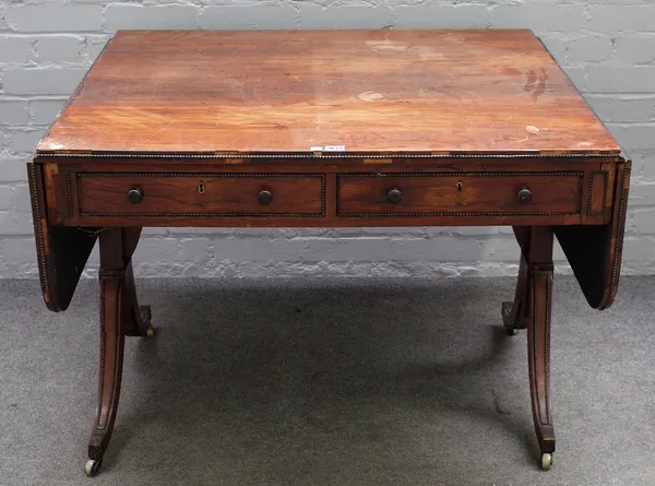 A Regency rosewood sofa table, with a pair of frieze drawers on downswept supports, 99cm wide x 72cm high.