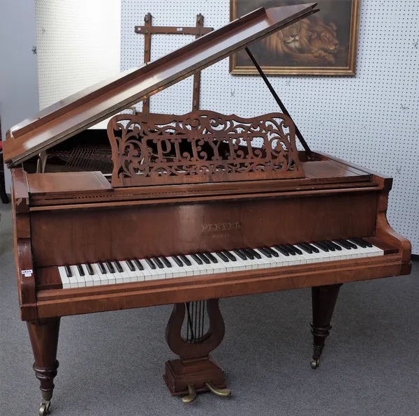 PLEYEL PARIS, a rosewood cased over strung iron framed baby grand piano, on turned tapering supports, number stamped 119136, 2588 LONDON, 140cm wide x