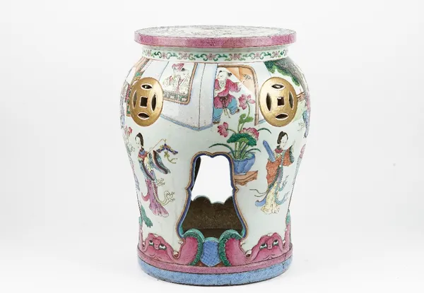 A Chinese famille-rose garden seat, 19th century, of baluster form, the sides painted with women and children at leisure and pierced with cash shaped