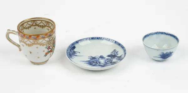 A small Chinese export blue and white teabowl and saucer from the Nanking Cargo, circa 1750, painted with the `Pagoda Riverscape' pattern, paper lot l