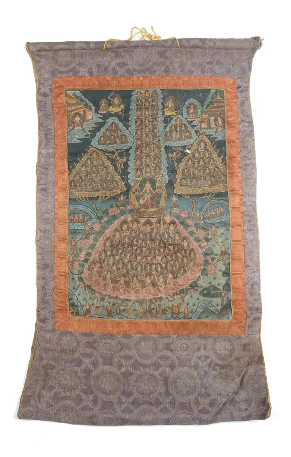 A Tibetan thangka, probably 19th century, pigments on cloth, painted in the centre with a seated Tsong-ka-pa wearing his monk's cap, surrounded by gro