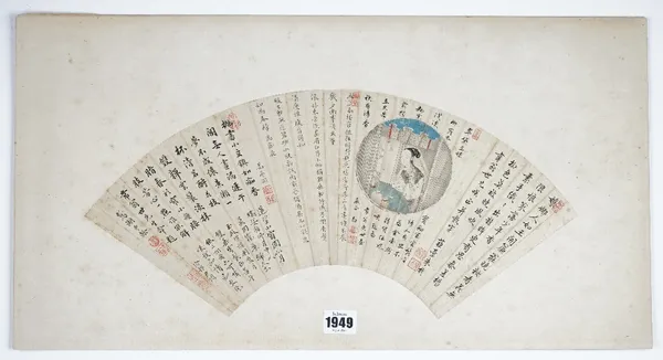 A Chinese fan painting, Qing dynasty, watercolour and ink on card, painted with lines of calligraphy and red seals, around a circular panel enclosing