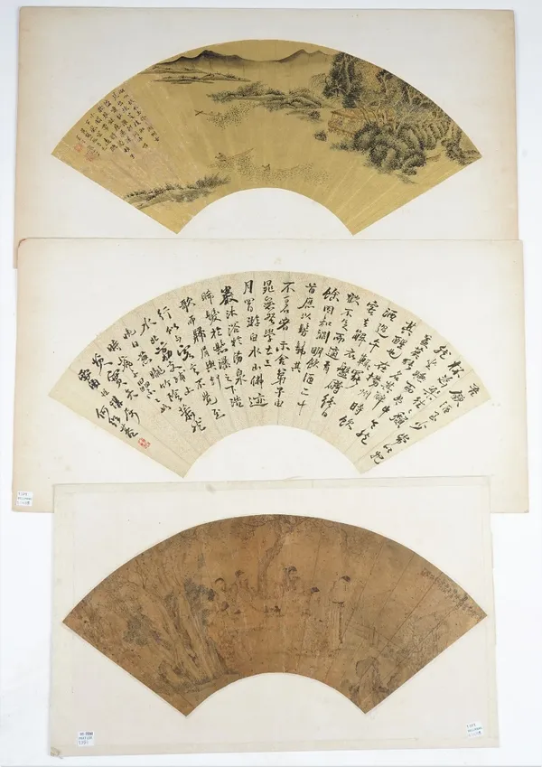 A Chinese fan painting, Qing dynasty, pen, ink and watercolour on card, painted with a river landcape against a solid gilt ground, signed and with two