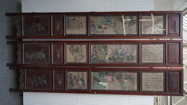 A large Chinese nine panel double-sided screen, circa 1900, each panel inset on one side with paintings under glass depicting boys at leisure, between