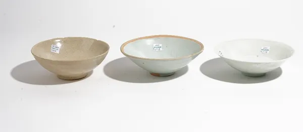 A Chinese qingbai bowl, Song dynasty, the interior decorated with foliage beneath a pale blue glaze, unglazed rim, 16.5cm diameter; another qingbai gl