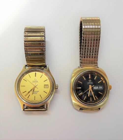 An Omega Automatic Seamaster Cosmic 2000 gilt metal fronted and steel backed gentleman's wristwatch, the signed dark blue dial with gilt baton numeral